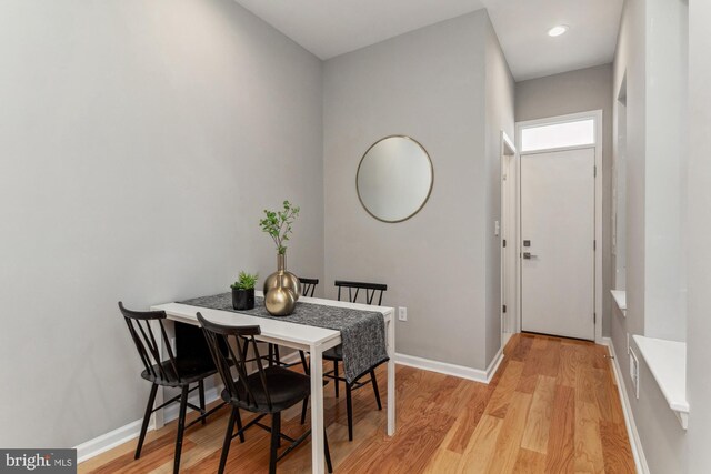 dining area with light wood-type flooring