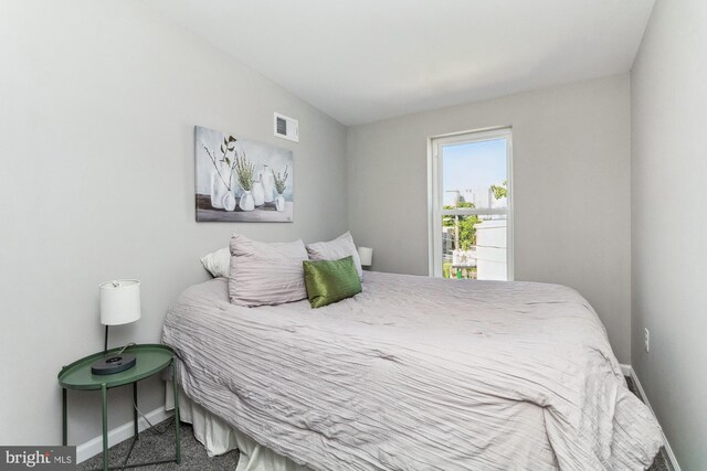 bedroom featuring carpet