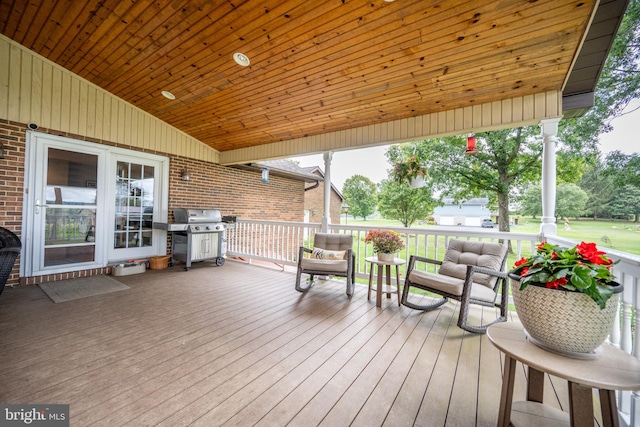 wooden deck featuring grilling area