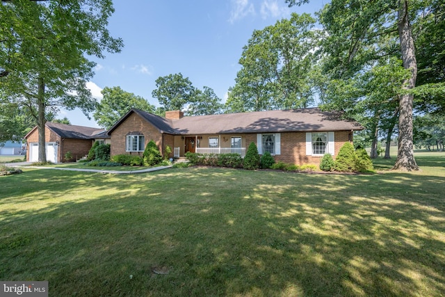 single story home with a front lawn