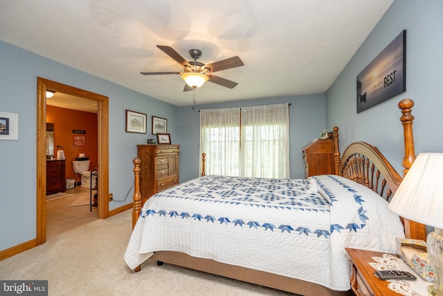 tiled bedroom with ceiling fan