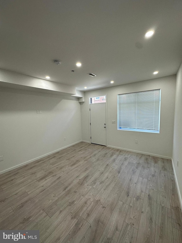 empty room featuring light hardwood / wood-style floors