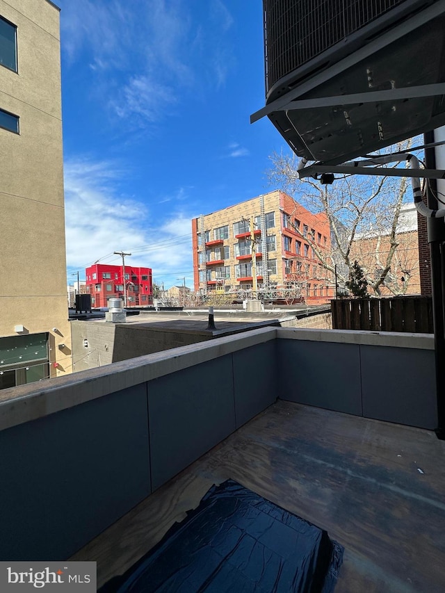 view of patio / terrace featuring a balcony and a grill