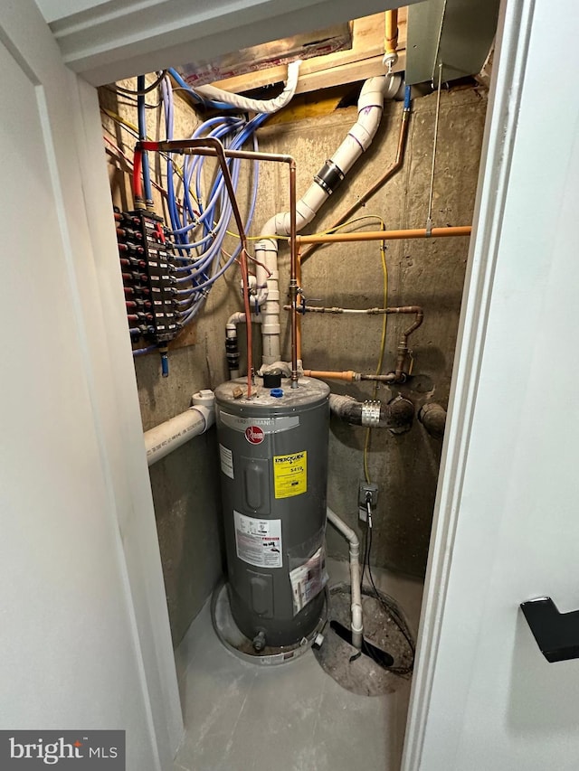 utility room with electric water heater