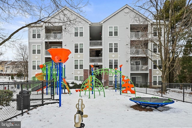 view of snow covered playground