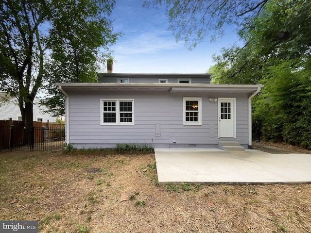 rear view of property with a patio area