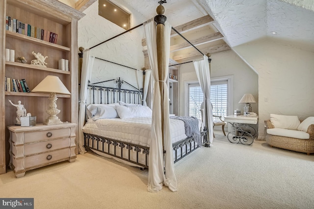 carpeted bedroom featuring a textured ceiling