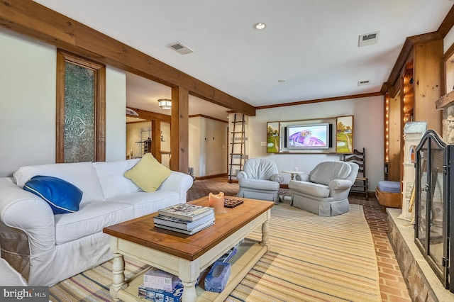 living room featuring crown molding