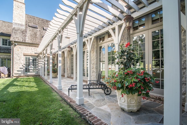 view of patio / terrace featuring a pergola and french doors