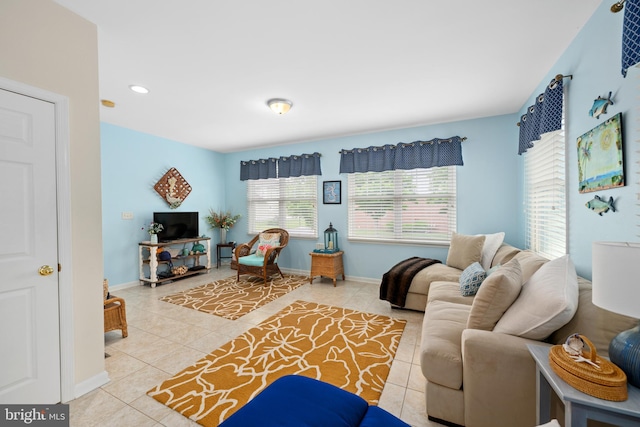 living room with tile patterned flooring