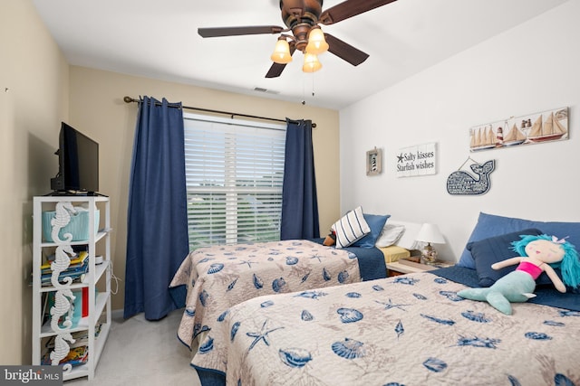 carpeted bedroom with ceiling fan