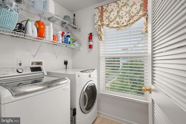 laundry area featuring washing machine and dryer