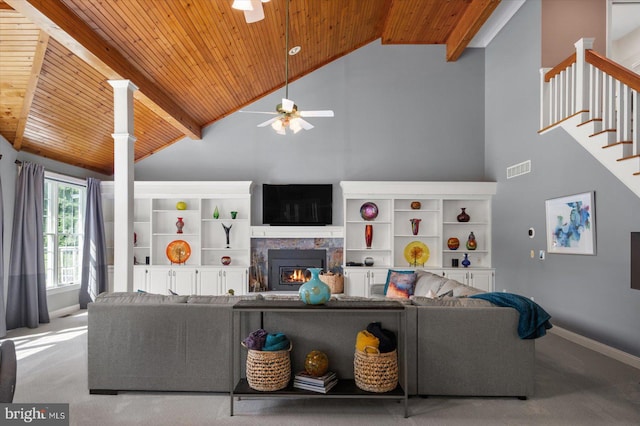 carpeted living room with beam ceiling, ceiling fan, high vaulted ceiling, and wood ceiling