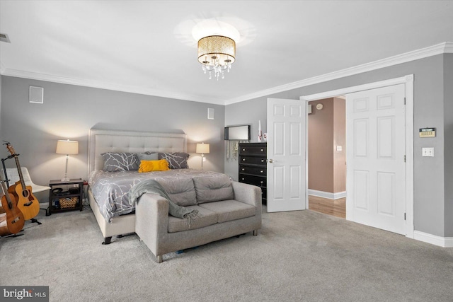 carpeted bedroom with an inviting chandelier and ornamental molding