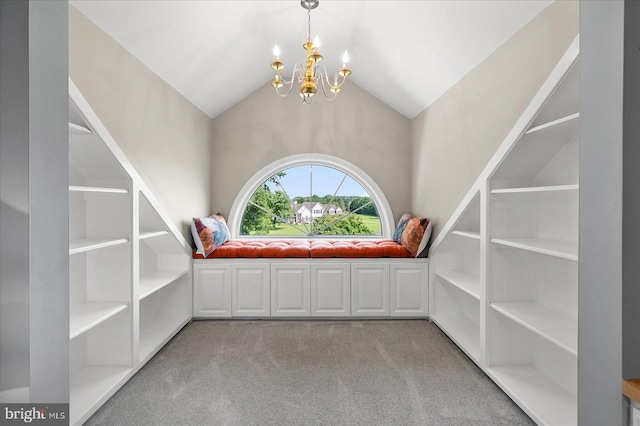 interior space with an inviting chandelier, lofted ceiling, and light carpet