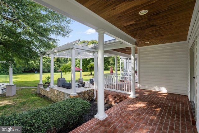 view of patio featuring a pergola