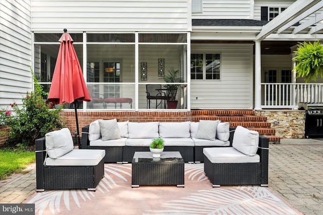 view of patio / terrace featuring area for grilling and outdoor lounge area