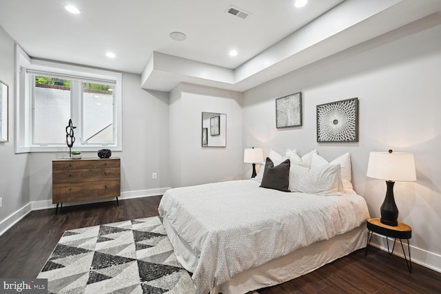 bedroom featuring dark hardwood / wood-style floors