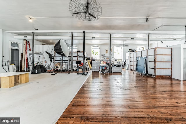 gym featuring hardwood / wood-style floors