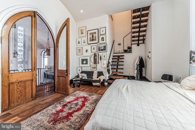 bedroom featuring recessed lighting and wood finished floors