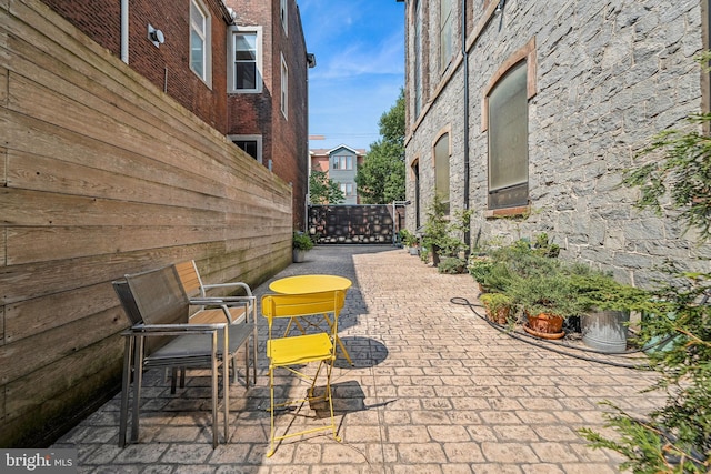 view of patio with fence