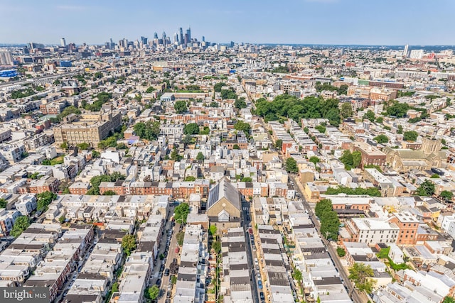 birds eye view of property with a view of city