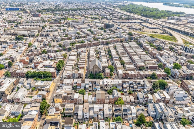 birds eye view of property with a view of city