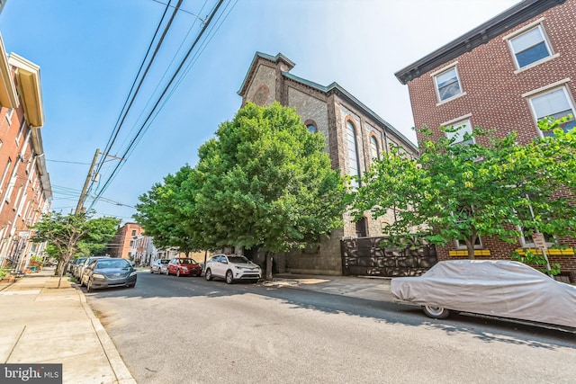 exterior space featuring sidewalks and curbs