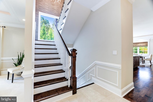 staircase with crown molding