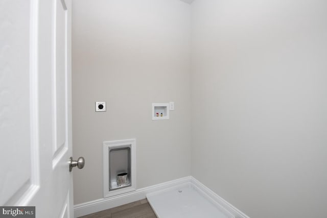 laundry area featuring washer hookup, wood-type flooring, and electric dryer hookup