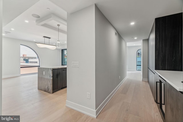 corridor featuring light hardwood / wood-style floors