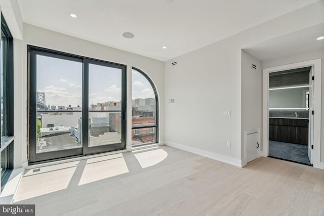 empty room featuring light hardwood / wood-style flooring