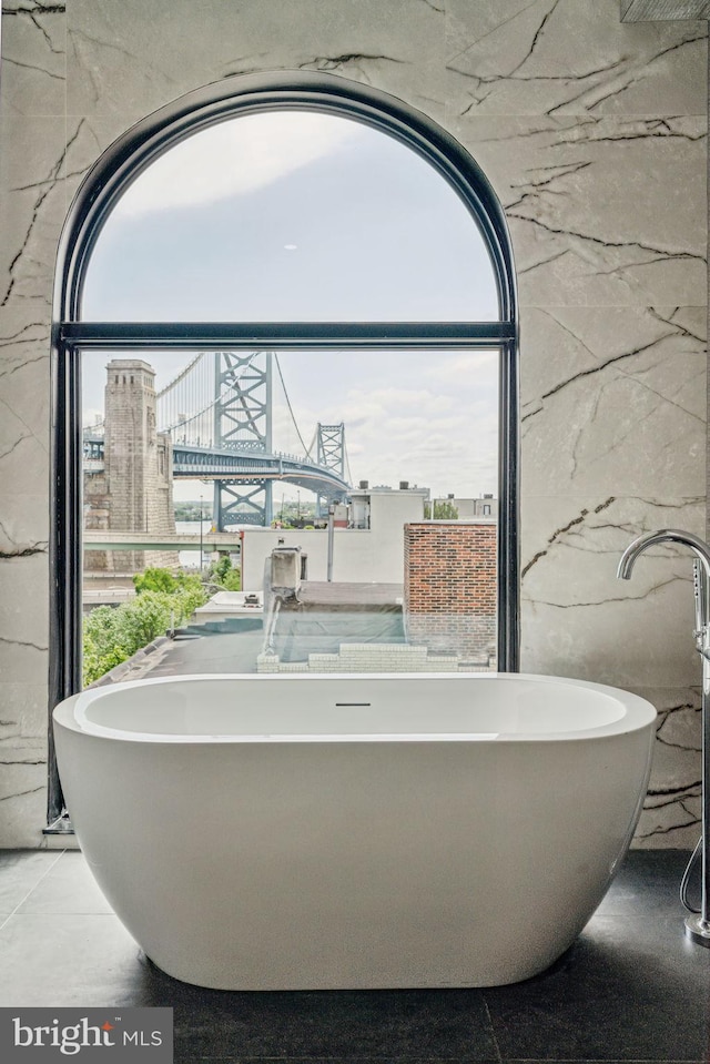 bathroom with a tub