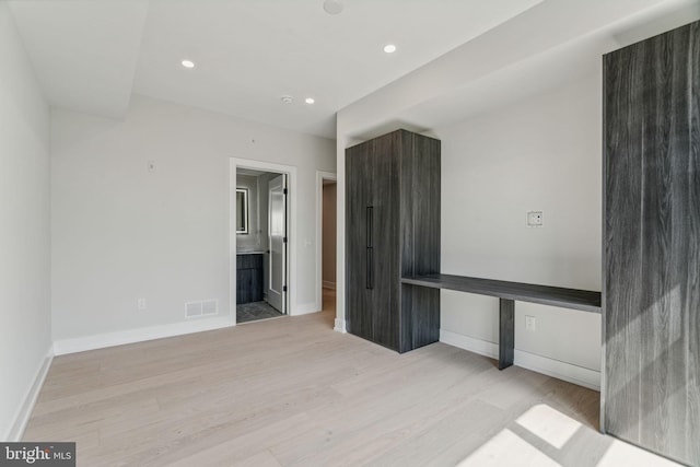 empty room featuring light hardwood / wood-style flooring