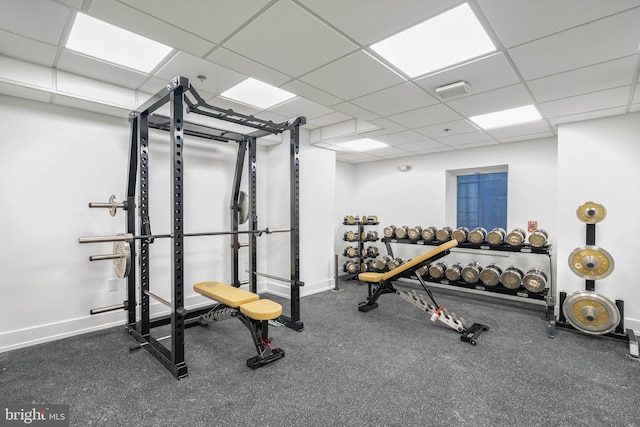 gym featuring a drop ceiling