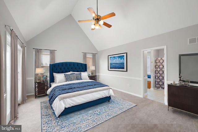 bedroom featuring ceiling fan, light carpet, and high vaulted ceiling