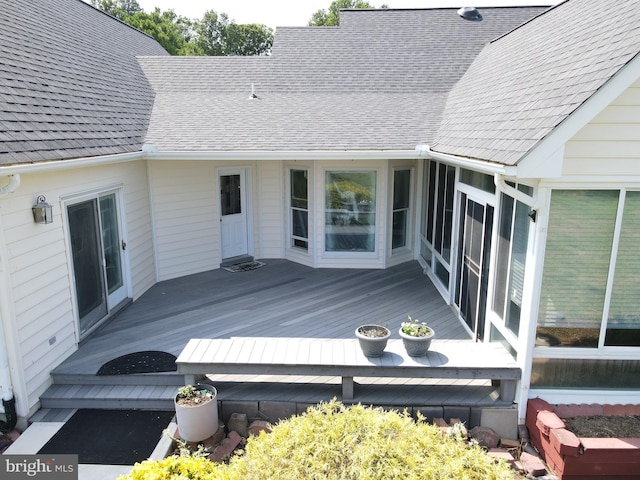 deck featuring a sunroom