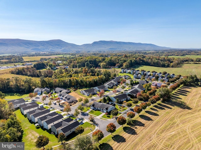 drone / aerial view featuring a mountain view