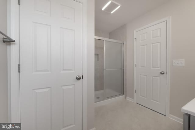 bathroom featuring a stall shower