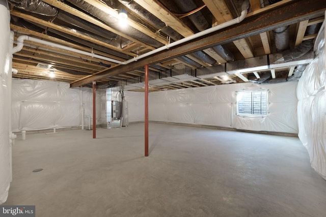 basement featuring heating unit