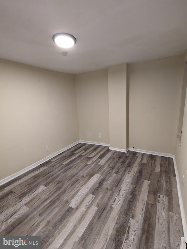 empty room featuring hardwood / wood-style flooring