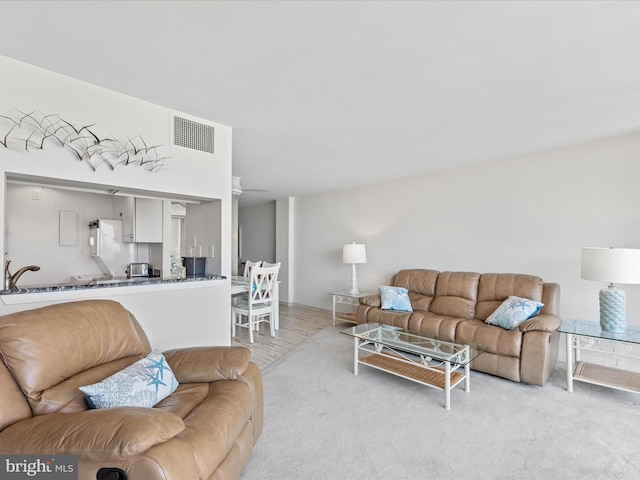 living room featuring ceiling fan