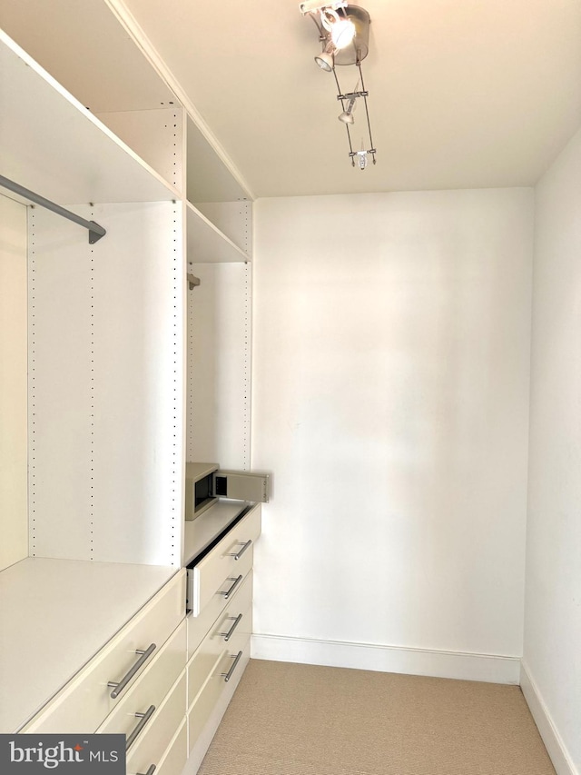 bathroom featuring vanity, toilet, tile patterned flooring, and an enclosed shower