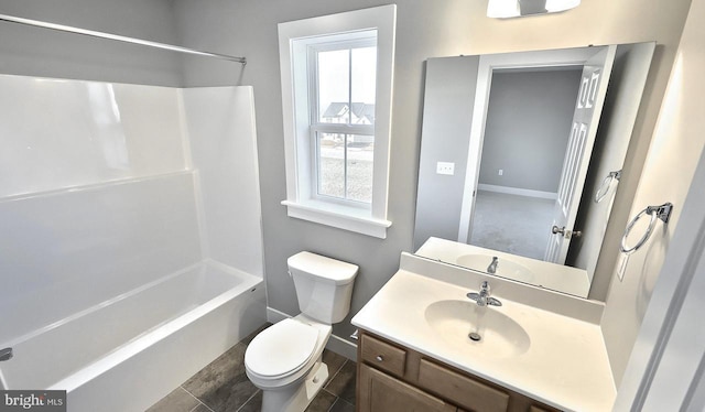 full bathroom with vanity, toilet, and  shower combination