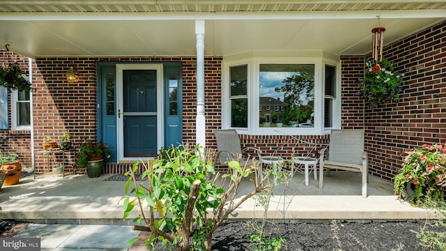 entrance to property with covered porch