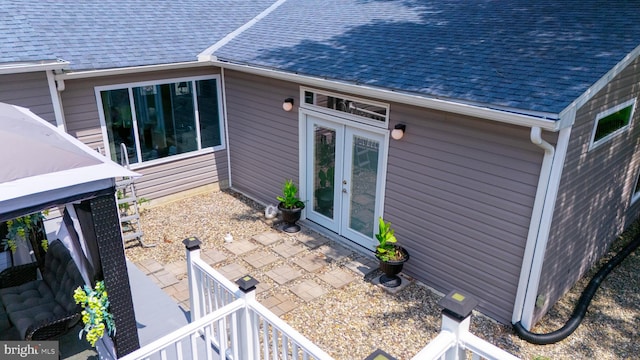 view of home's exterior featuring french doors and a patio