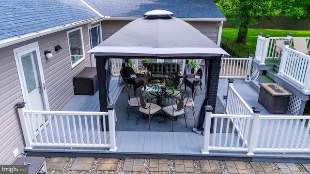 wooden terrace with a gazebo