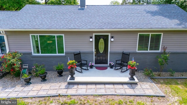 back of property with a patio area