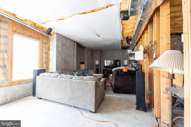 living room with concrete floors