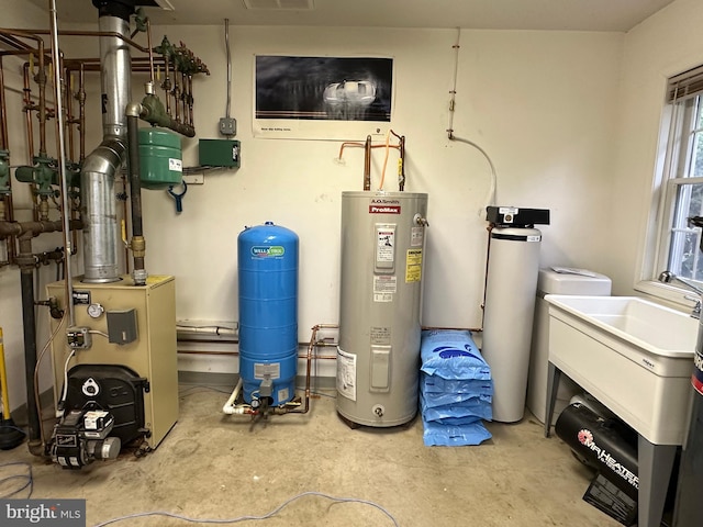 utility room featuring electric water heater